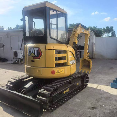 Escavatore usato Caterpillar 303.5E, vernice originale, componenti principali intatti.